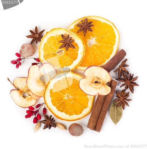 Image of Christmas spices and dried orange sliceson 