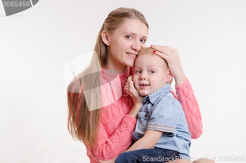 Image of Young mother and three year old son
