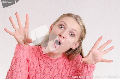 Image of Girl having fun scares