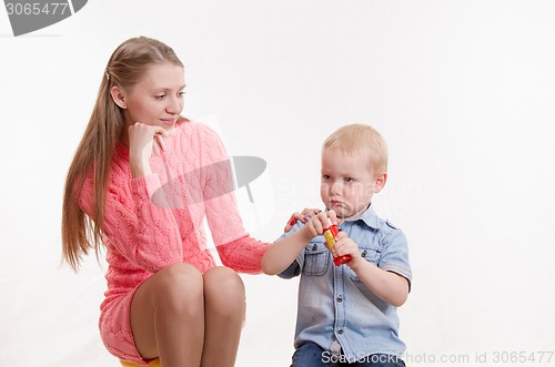 Image of The boy ran out soap bubbles