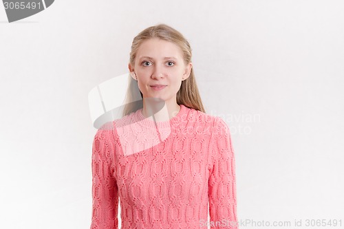 Image of Portrait of a blank European girl on light background