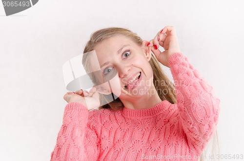 Image of Portrait of cheerful girl with protruding ears