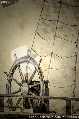 Image of wheel of an old sailing ship