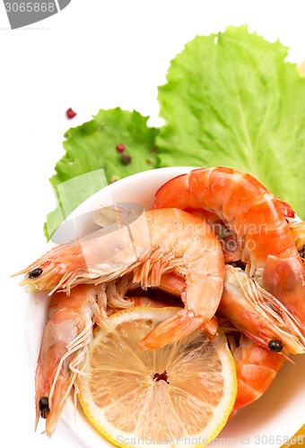 Image of shrimps, lemon and lettuce leaves