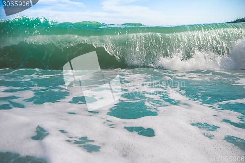 Image of sea surf foamy beach wave nearby