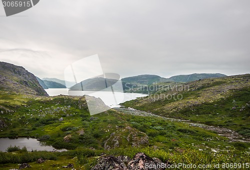 Image of northern polar landscape with lake in  summer