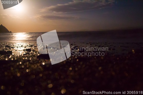 Image of night sea moon light of a wave surf