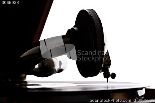 Image of gramophone needle playing record