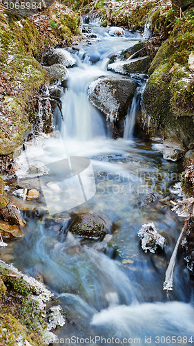 Image of Small creek with a waterfall close up