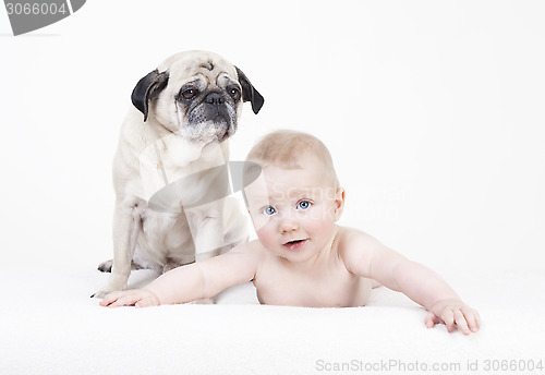 Image of baby with dog