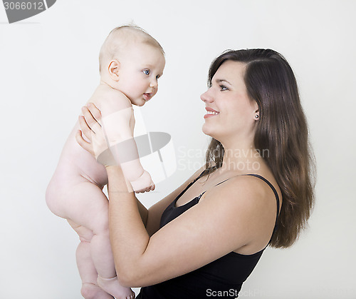 Image of mother with naked baby