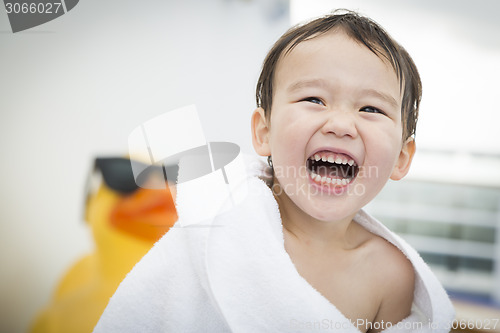 Image of Mixed Race Boy Having Fun at the Water Park