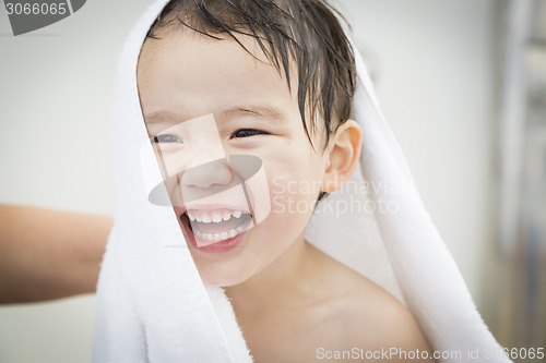 Image of Mixed Race Boy Having Fun at the Water Park