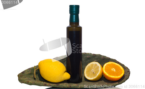 Image of olive oil and sicilian fruits