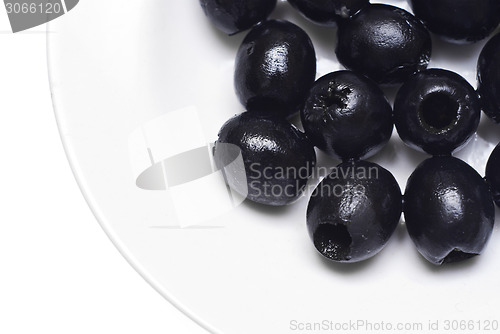 Image of Black pitted olives isolated 