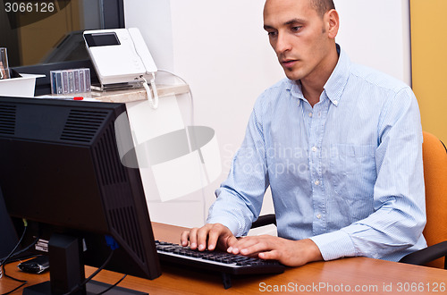 Image of businessman in office