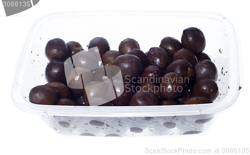 Image of olives in plastic box surface isolated