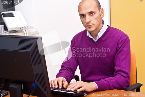 Image of businessman in office