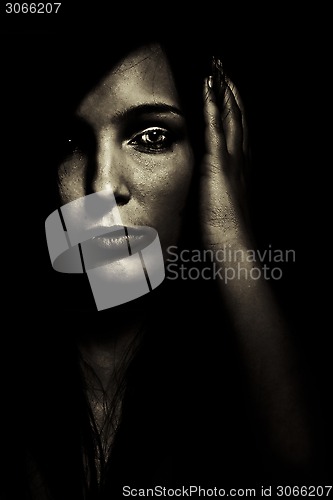 Image of horror expression dark young girl face