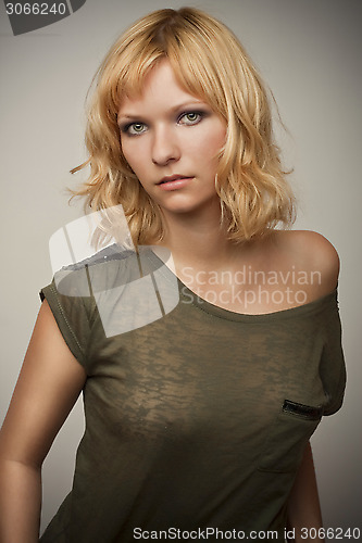 Image of glamour girl in transparent shirt