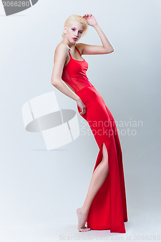 Image of attractive blond girl in red dress
