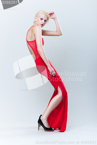 Image of attractive blond girl in red dress