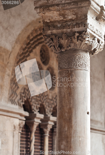 Image of Detail of old weathered column in steri palace sicily
