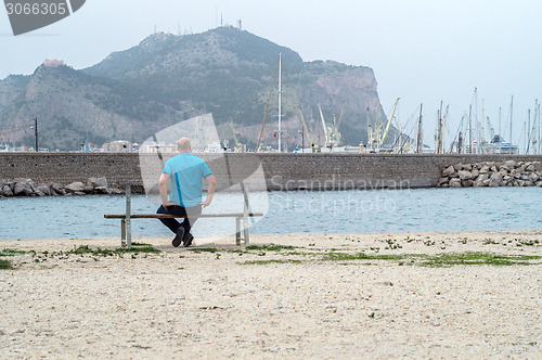 Image of man on bench