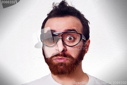 Image of funny man with fancy broken glasses