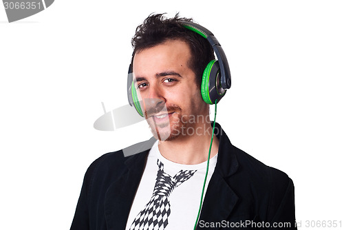 Image of young man with green headphones listening to music