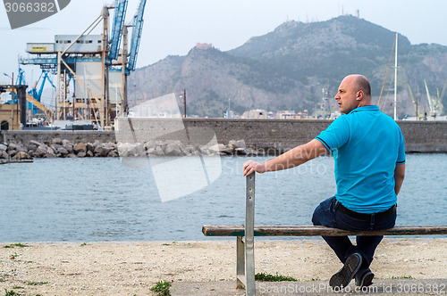 Image of man on bench