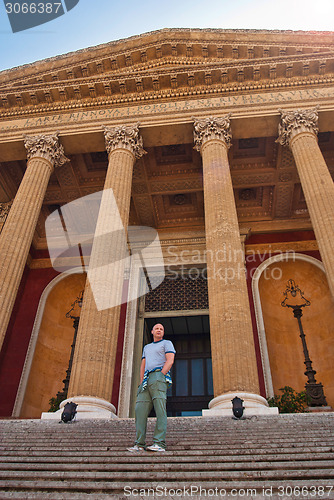 Image of tourists on the stairs of  Theatre Massimo of Palermo