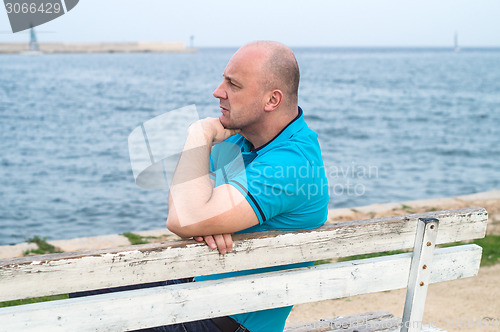 Image of man on bench