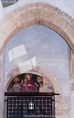 Image of Stone arches and fresco in steri palace in Palermo