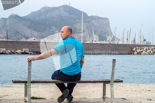 Image of man on bench