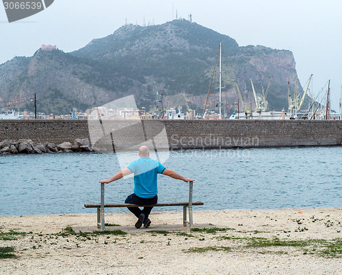 Image of man on bench