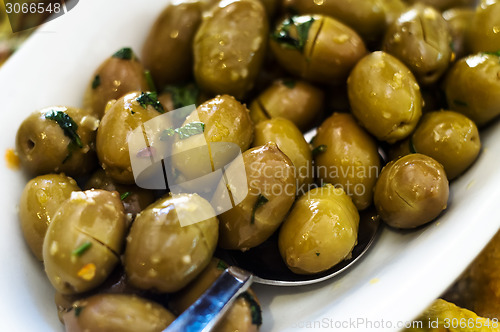 Image of Marinated green olives in bowl