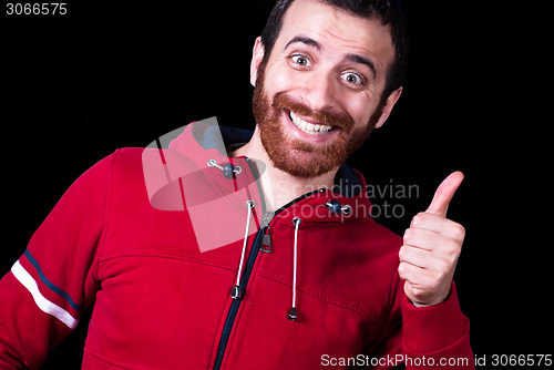 Image of happy business man going thumbs up