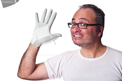 Image of Happy adult in Rubber Gloves 