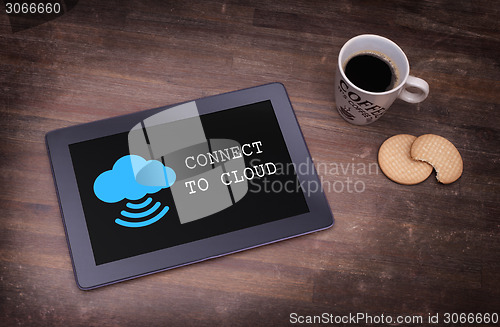 Image of Cloud-computing connection on a digital tablet pc