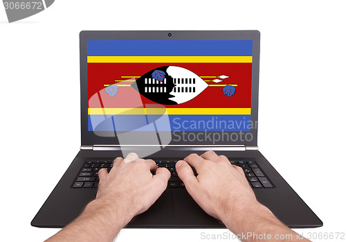 Image of Hands working on laptop, Swaziland