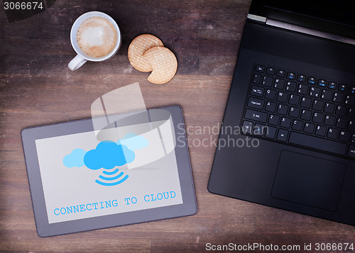 Image of Cloud-computing connection on a digital tablet pc