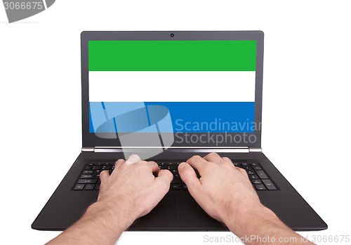 Image of Hands working on laptop, Sierra Leone