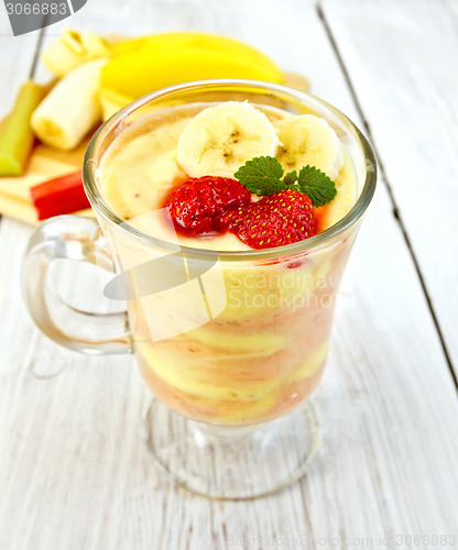 Image of Dessert milk strawberry and banana on light board