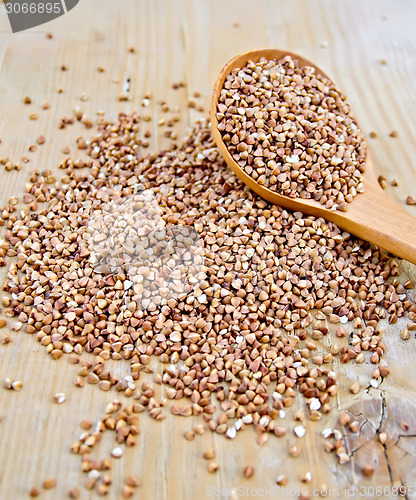 Image of Buckwheat with spoon on board