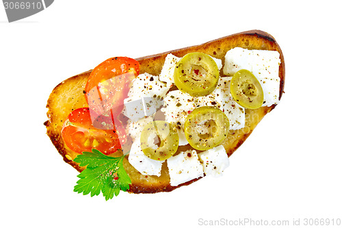 Image of Sandwich with feta cheese and olives on top