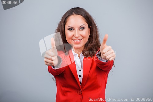 Image of Young attractive girl in red with folders