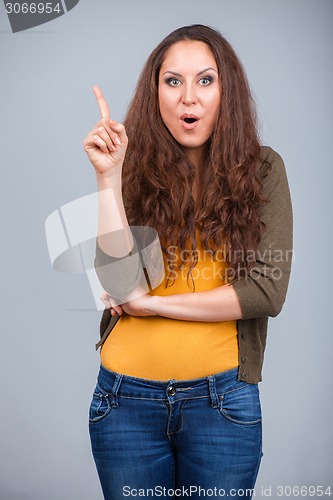 Image of Woman pointing up