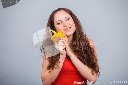 Image of Woman with bell pepper