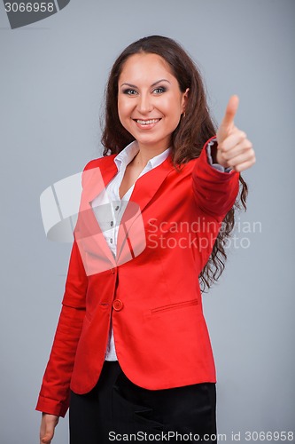 Image of Young attractive girl in red with folders